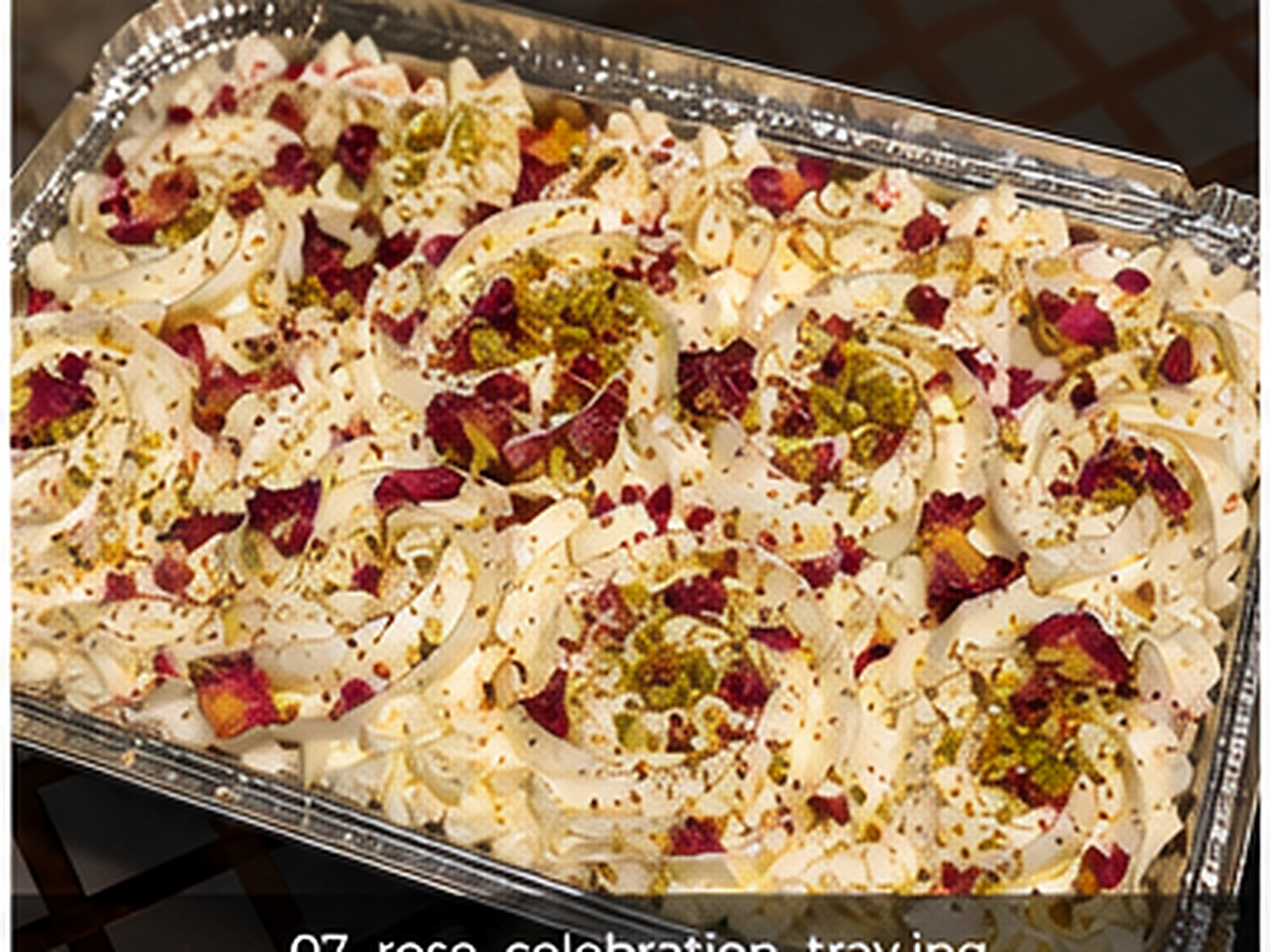 Rose milk cake tray with cream, pistachio and rose petals